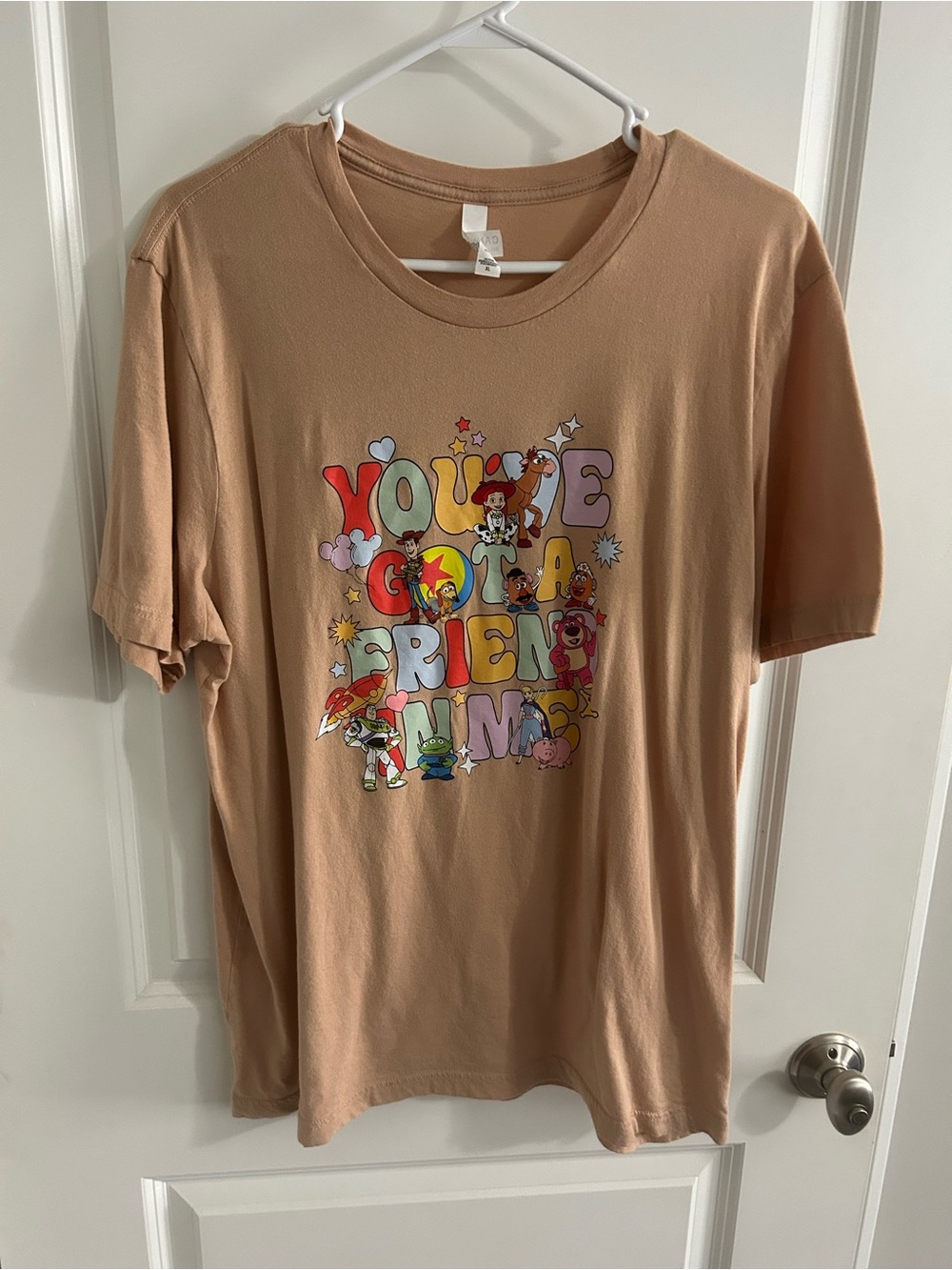 Toy Story: Bella Canvas Beige Graphic Tee “You’ve Got A Friend In Me”